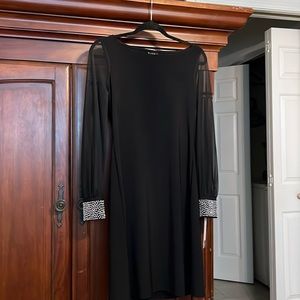 S Nicole Miller black knee length dress/sheer long sleeves silver studded cuffs